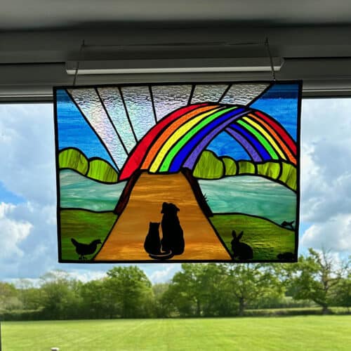 Stained glass artwork at the Time2SayGoodbye clinic. Time2SayGoodbye offer homely pet euthanasia at Cherry Tree pet crematorium.